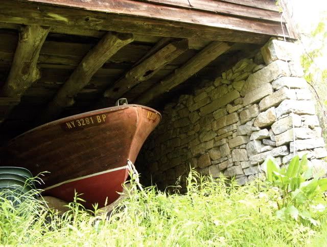 Boat under barn